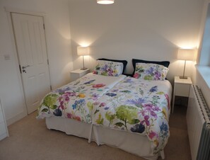 King Bed with individual duvets and bathroom en suite 