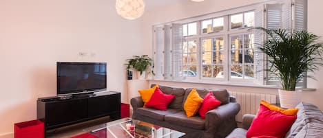 Bright, sunny and spacious sitting room with sofa beds, TV, DVD  