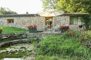 Rear of gite & terrace for a lovely breakfast or barbecue