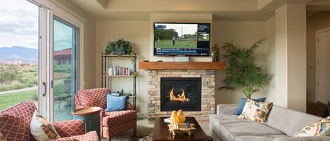 Family room featuring fireplace and large screen tv