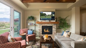 Family room featuring fireplace and large screen tv
