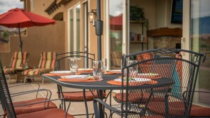 Patio featuring dining table