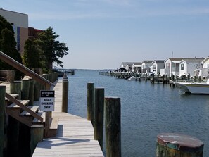 doc and canal in back of property leading to bay
