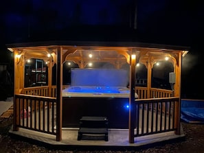 Shared gazebo with 6 person hot tub.