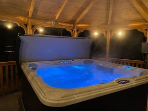 Shared outdoor hot tub. We recommend brining a robe and slippers if you are planning on using the hot tub. Towels are provided.