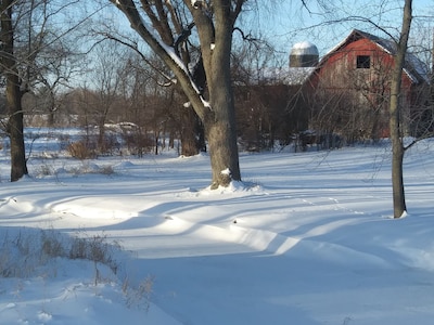 Country home with flowing river