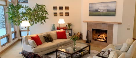 Living Room with Wood Burning Fireplace.