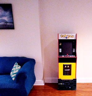 There's an arcade game in the den for nostalgic fun with Pac-Man and Galaga! 