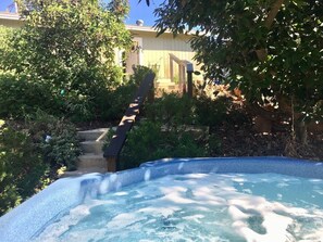 Front entry hidden in the avocado trees.