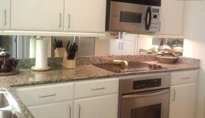 Fully equipped kitchen with stainless appliances
 