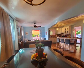 Dining room, living room and kitchen allow guests to easily interact. 