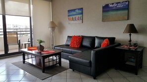 living room with pullout coach comfortably sleeps 2 people