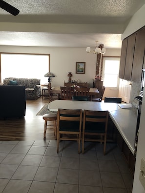 Additional table height seating at the counter. Room for 4-5 chairs.