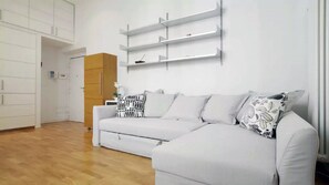 view of the living room with a double sofa bed