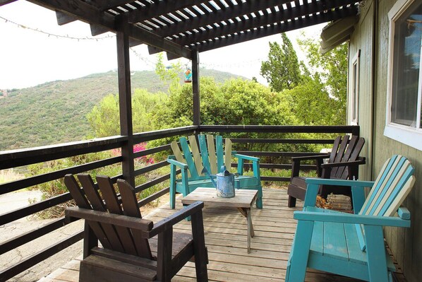 Experience cozy, farm-style living in a charming tri-plex unit on a serene fruit farm, offering fresh eggs, friendly animals and a peaceful retreat