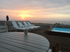 Sunrise on the deck with a hot coffee is waiting for you. 