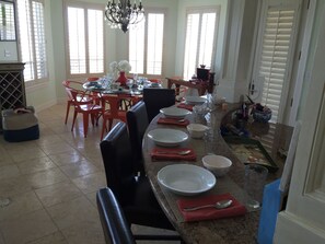 Dinner for 10, no problem. Comfortable bar seating for 4 + dining table