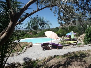 Natural lake-shaped pool overlooking the gulf of Palermo and Madonie mountains