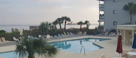 Balcony view with passing ship.