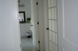 hallway to bathroom
