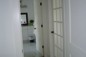 hallway to bathroom