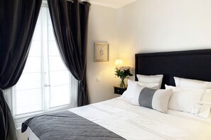 Two comfortable bedrooms with luxury bedding.