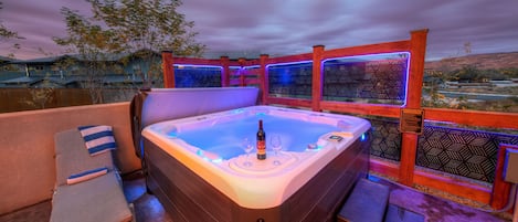 Come experience our private Hot Tub with sculpted seating for 7!