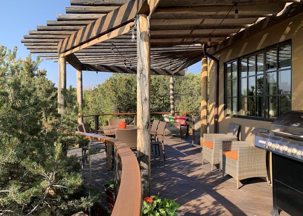 Deck provides multiple areas for socializing and viewing two mountain ranges