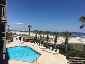 View from Balcony of Pool, Beach, Ocean, and Apache Pier.