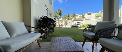 Private balcony with direct access to the garden and swimming pool