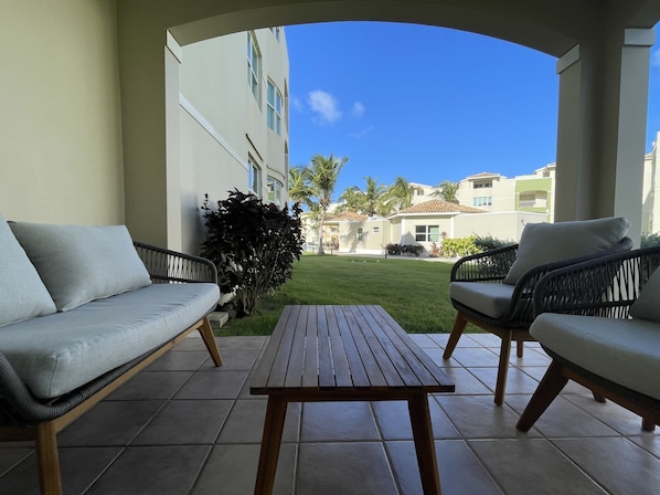 Private balcony with direct access to the garden and swimming pool
