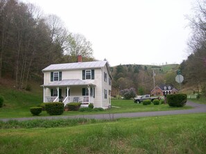 where gray truck is parked is where you will park above the boxwood hedges.   