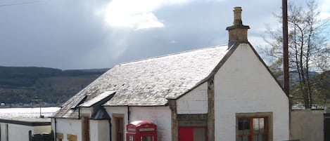 Post Office House, with Holy Loch behind.