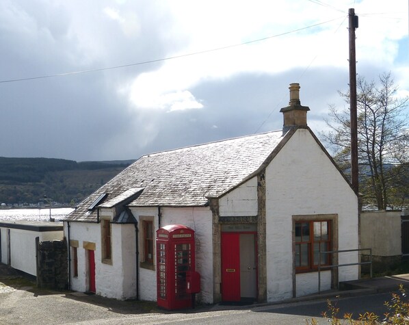 Post Office House, with Holy Loch behind.