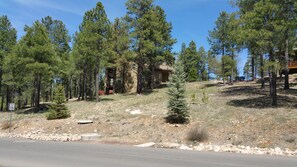 House in center of picture, you can see the beauty of this setting on a hill.