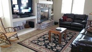 Great room with couch and love seat