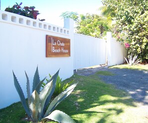 La Chata Beach House entrance with privacy gate.  
