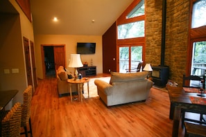 Living Room w/wood burning stove and flat screen TV