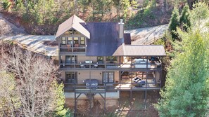 Back of the house showing expansive decks for lots of outdoor enjoyment.