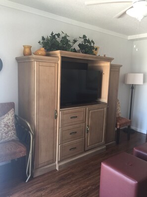 Plenty of seating to chat or watch a movie.  Mini fridge and storage for all!