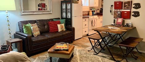 Beautifully furnished living room with new dining table.