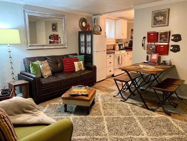 Beautifully furnished living room with new dining table.