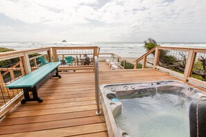 Exit from living area or Lighthouse Suite to the upper deck with hot tub.