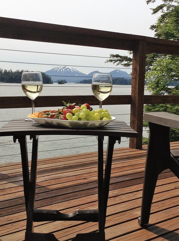 Large deck off the main living area with an  unobstructed view of Mt Edgecumbe