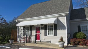 The Cary Cottage showing the accessible ramp leading to front door.