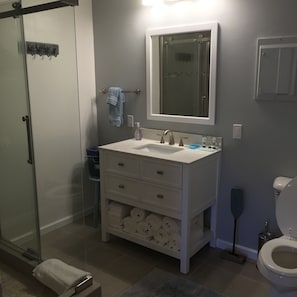 Master Bath features Glass Tiled Shower. Fully Stocked!