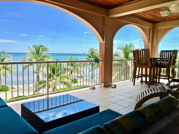 Veranda facing south with outdoor dining area 