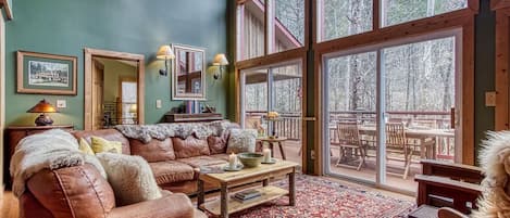 Spacious living room overlooking the river