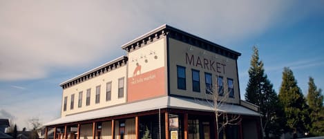 The lofts are located upstairs, above the Red Hills Market.