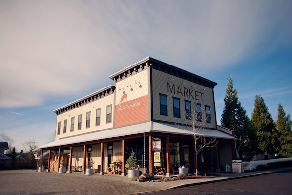 The lofts are located upstairs, above the Red Hills Market.